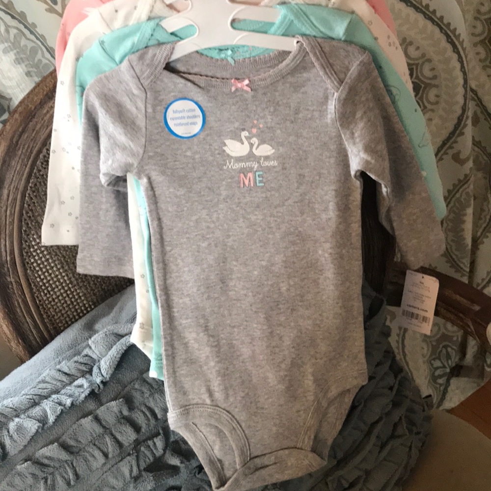 Four-piece Carter’s Long-sleeve Onesie Set Size 9m